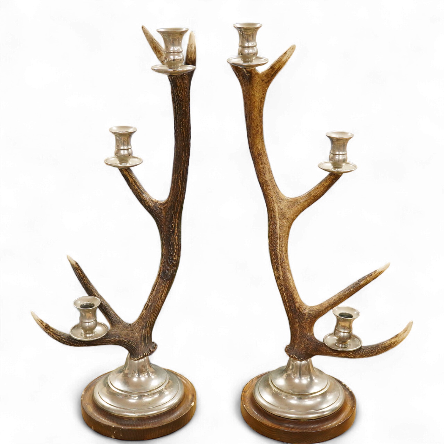 A pair of three light antler candlesticks, 67cm high